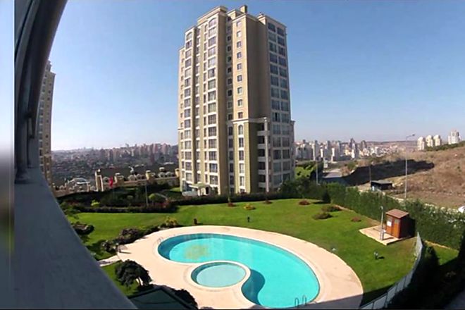 Landscaped grounds and pool at Uphill Court, Istanbul